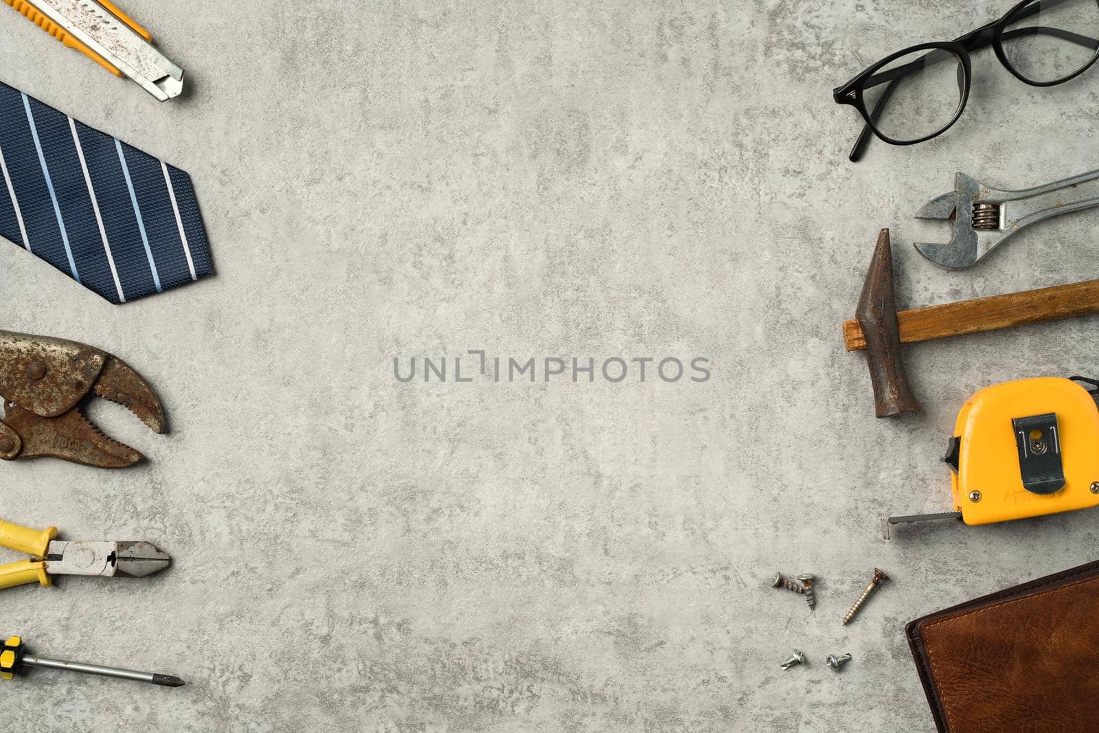 Top view design concept of Father's day and labor day with working tools on blue background.