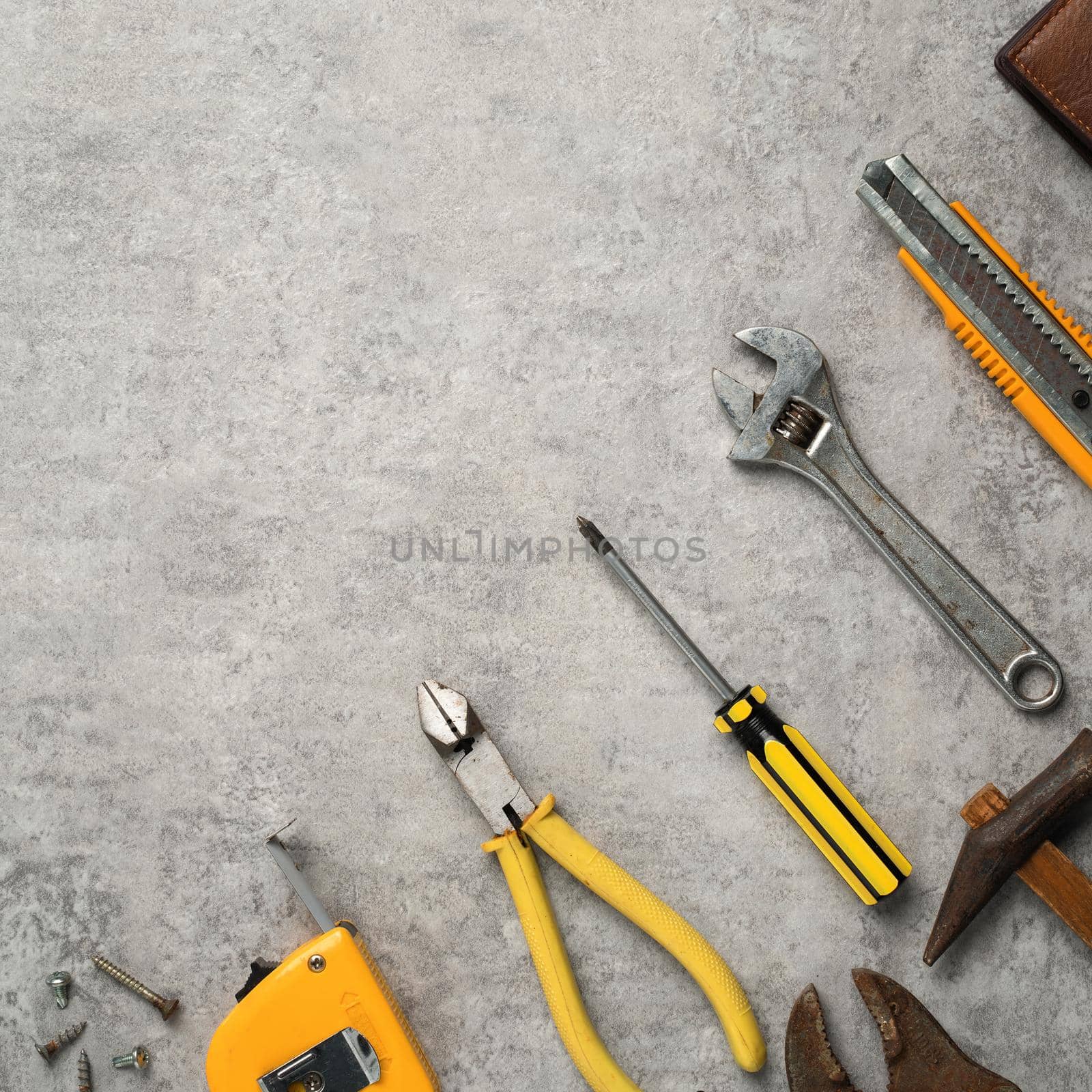Top view design concept of Father's day and labor day with working tools on blue background.