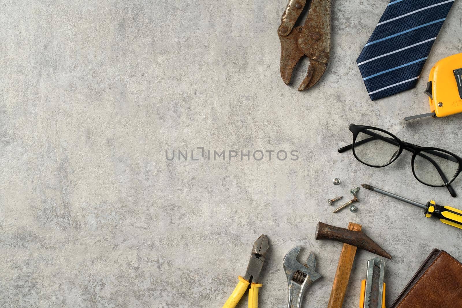 Top view design concept of Father's day and labor day with working tools on blue background.