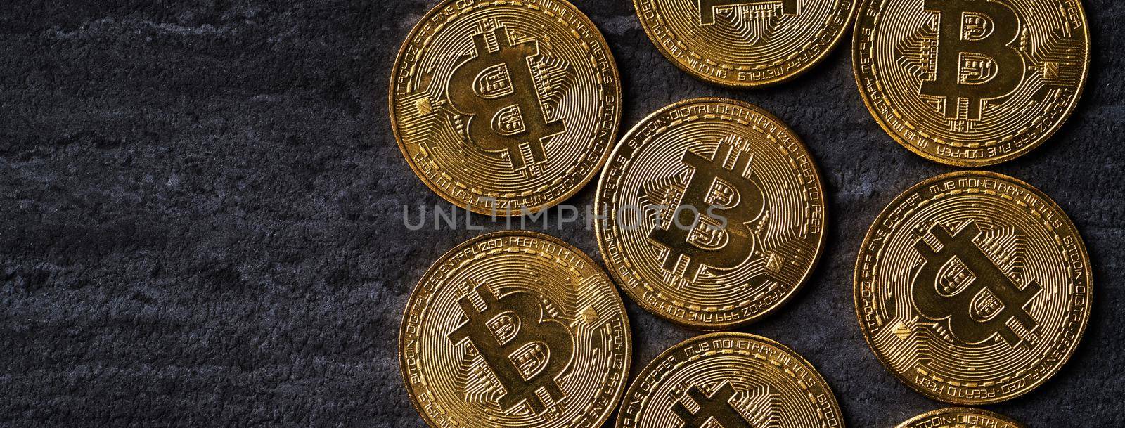 Bitcoin. Top view business cryptocurrency concept money on dark black slate table background.