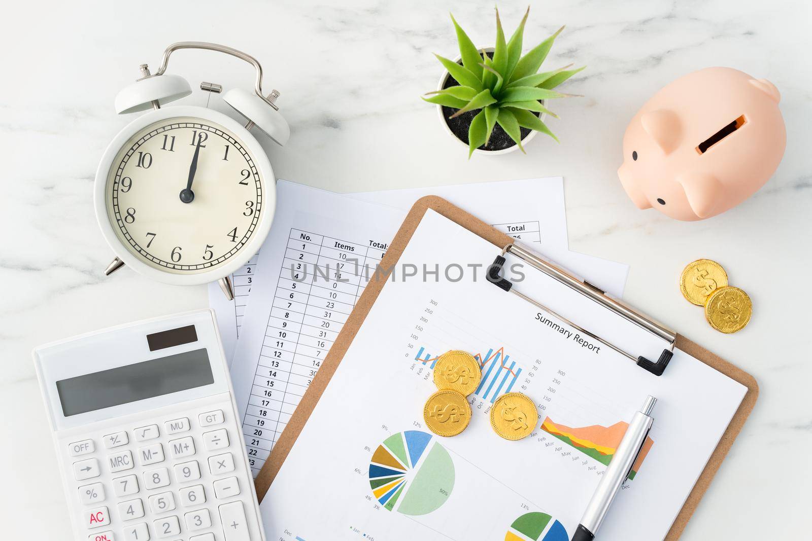 Top view of reading the overview and calculating, paying tax concept on marble white table.