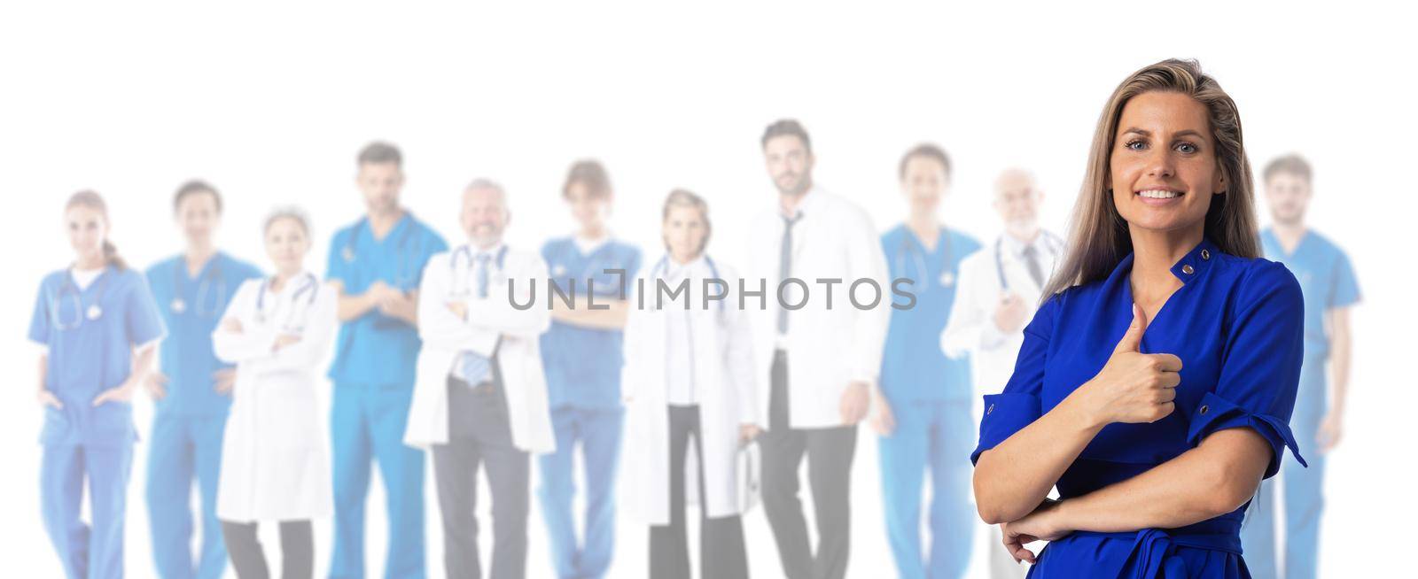 Happy female patient with thumb up and team of doctors isolated on white background