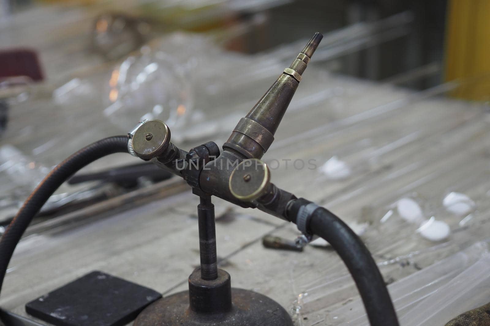 Gas burner in a glass-blowing workshop. Technology and science. High quality photo