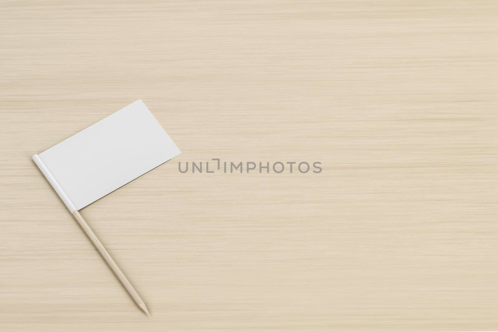 Blank toothpick flag on wood background