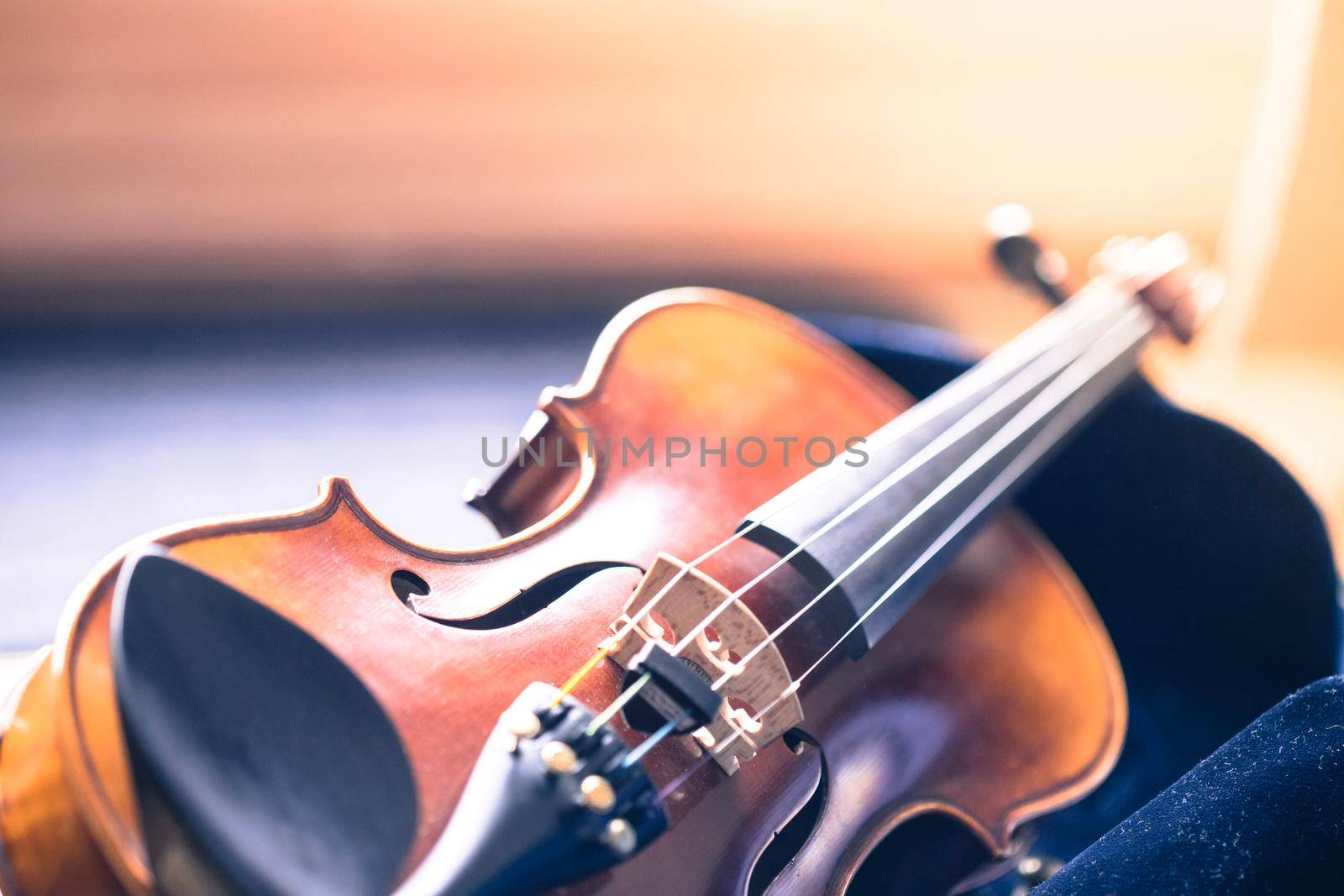Violin music instrument concept: vintage style close up of violin by Daxenbichler