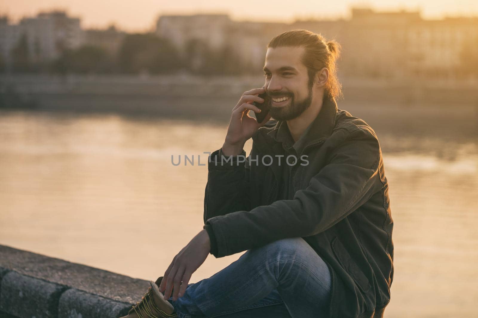 Businessman using phone by Bazdar