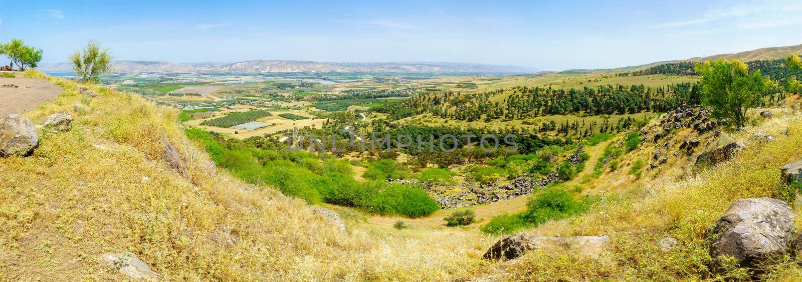 Menahamiya, Israel - April 21, 2021: Panoramic view of the Sea of Galilee and the Lower Jordan River valley, with visitors. Northern Israel