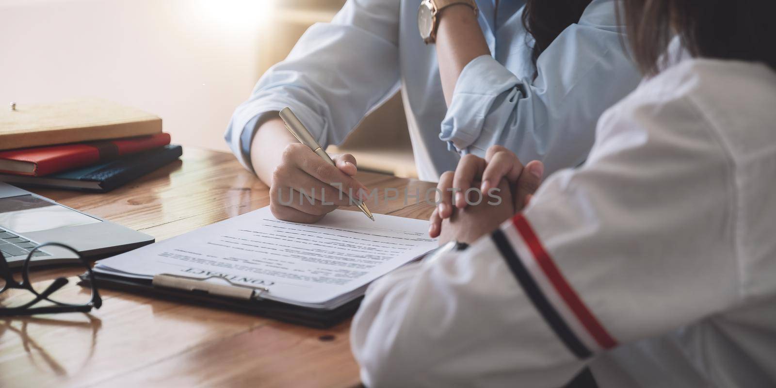 Real estate agent offer hand for customer sign agreement contract signature for buy or sell house. Real estate concept contact agreement concept. by nateemee