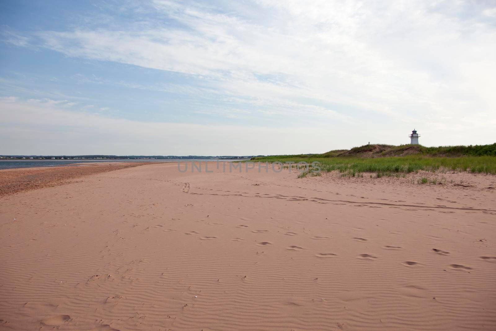 July 27, 2019 - French River, PEI - The landmark lighthouse near the beach in PEI on a summer day 