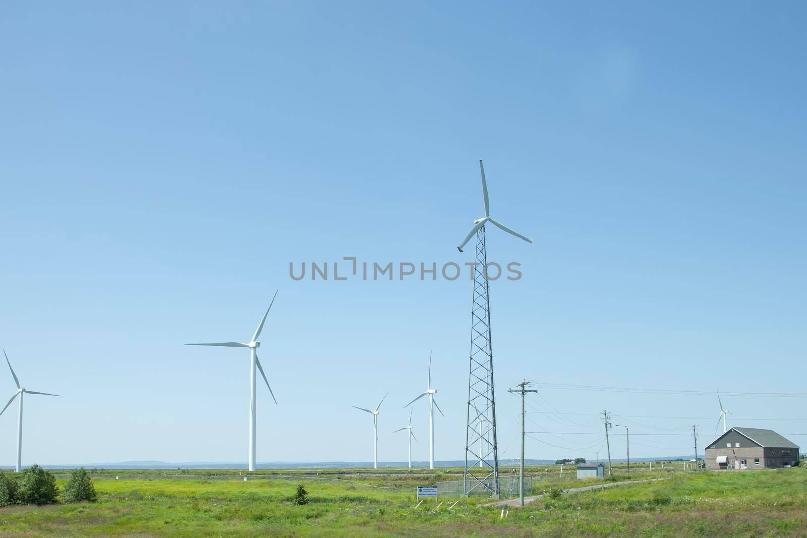 Highway windmill turbines  by rustycanuck