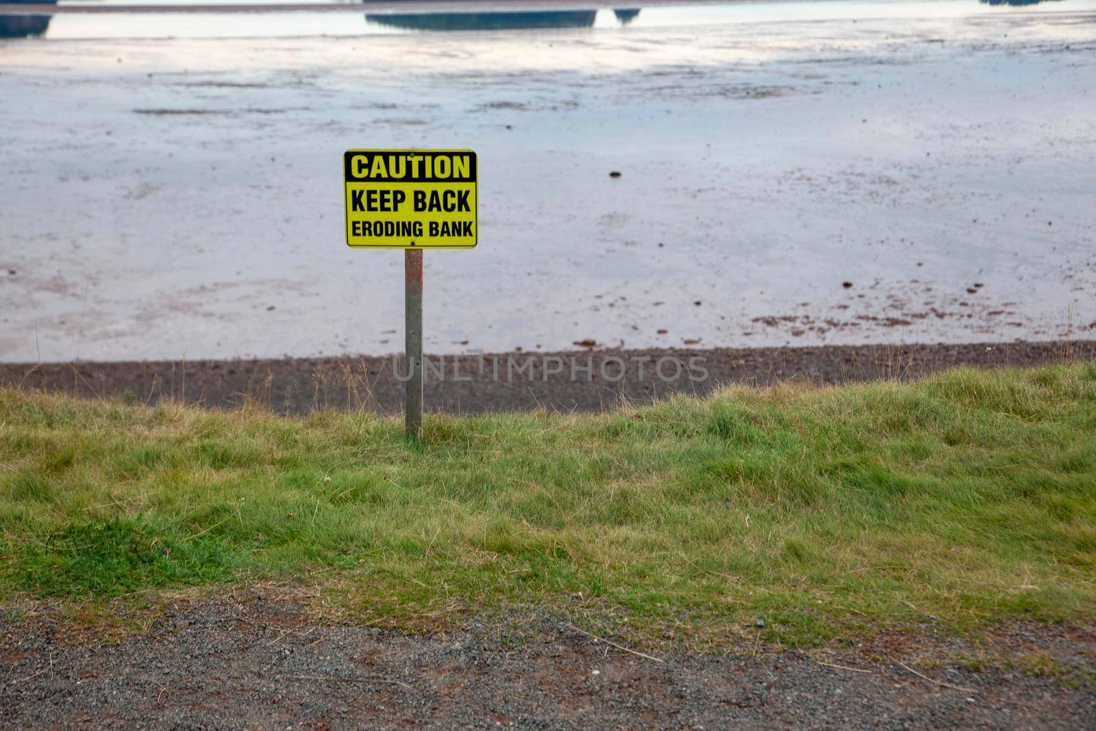 sign for eroding bank  by rustycanuck