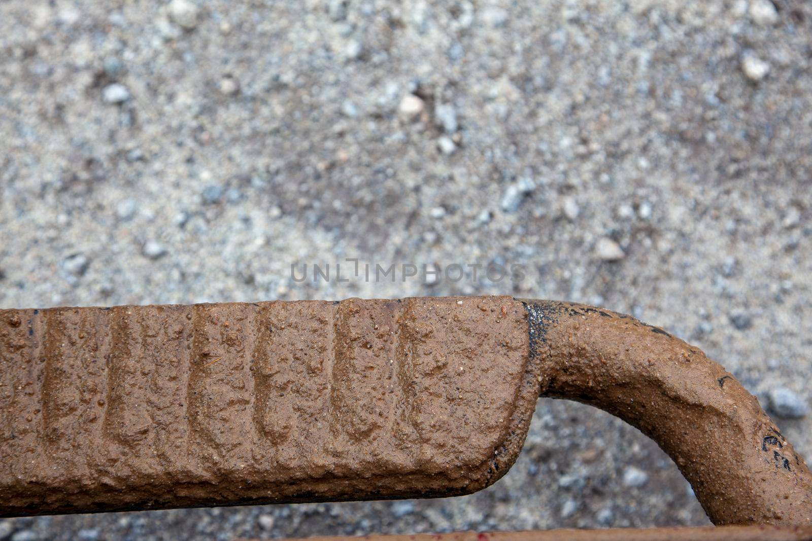 the side of a truck's running board covered with mud from off roading 