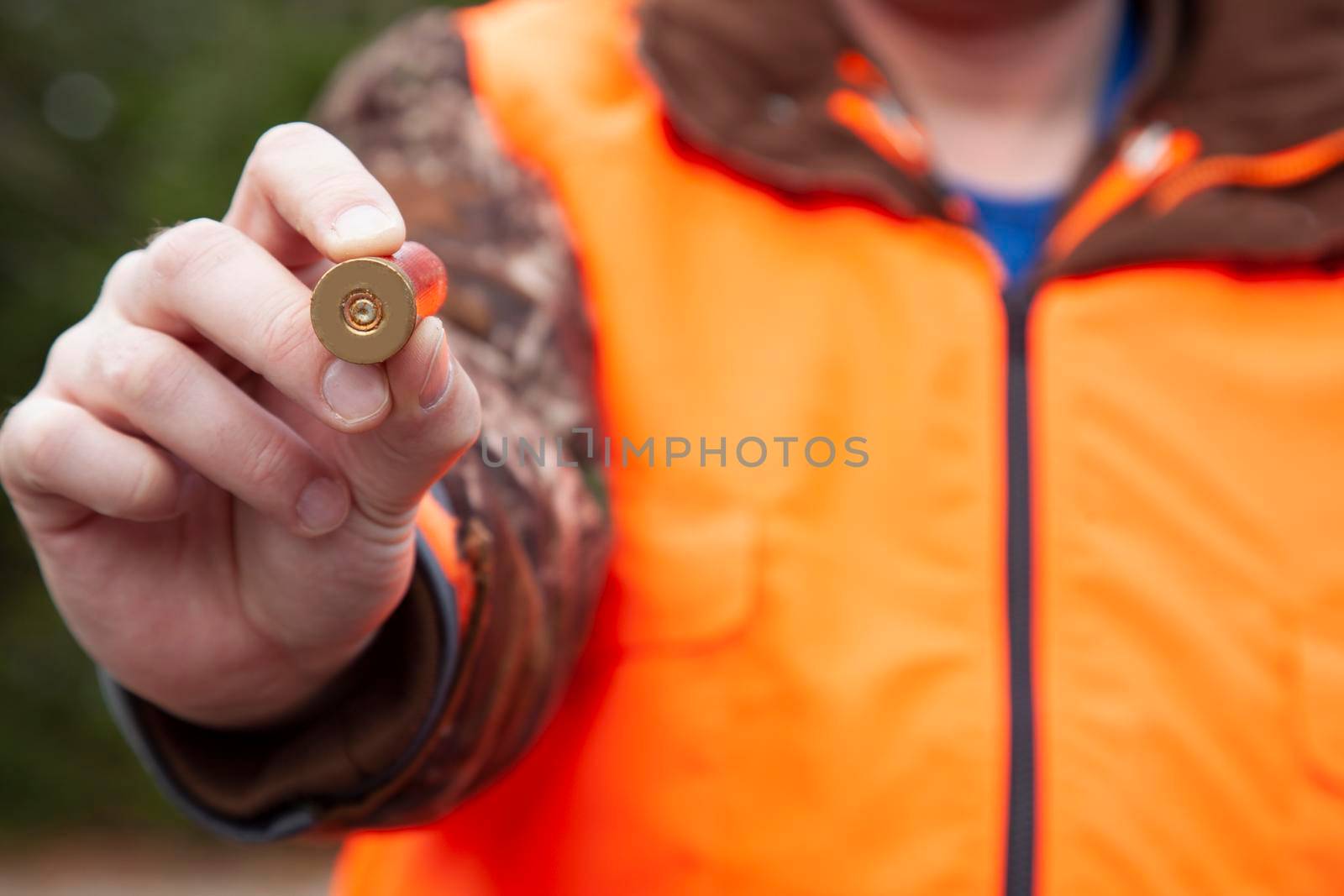 12 gauge shotgun shell with hunter by rustycanuck