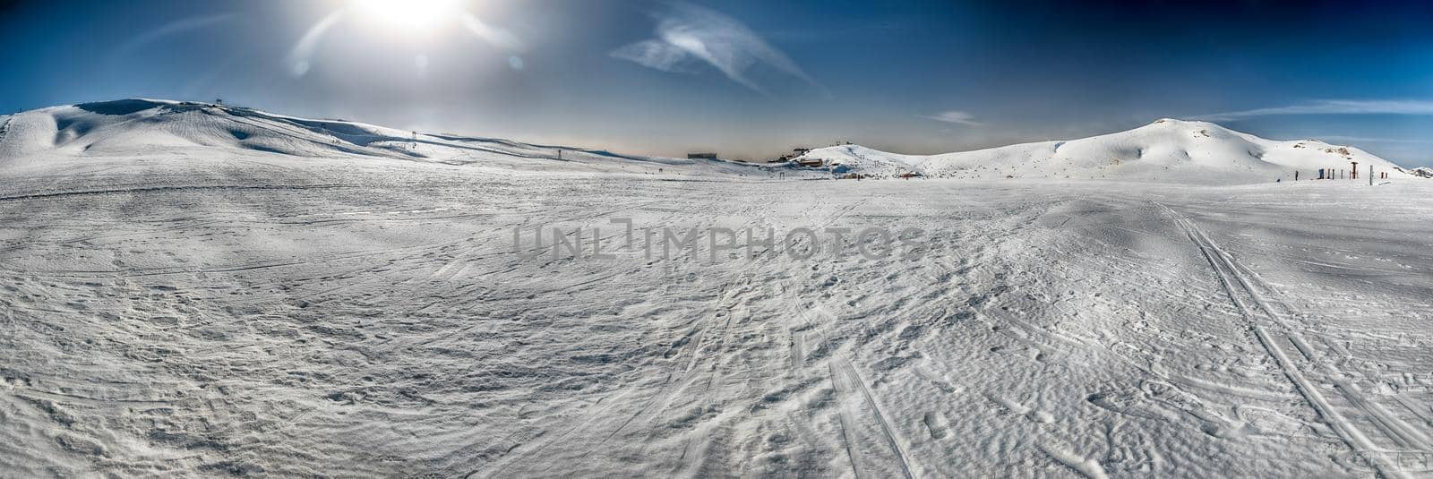 Scenic winter landscape with snow covered mountains, Campocatino, Italy by marcorubino