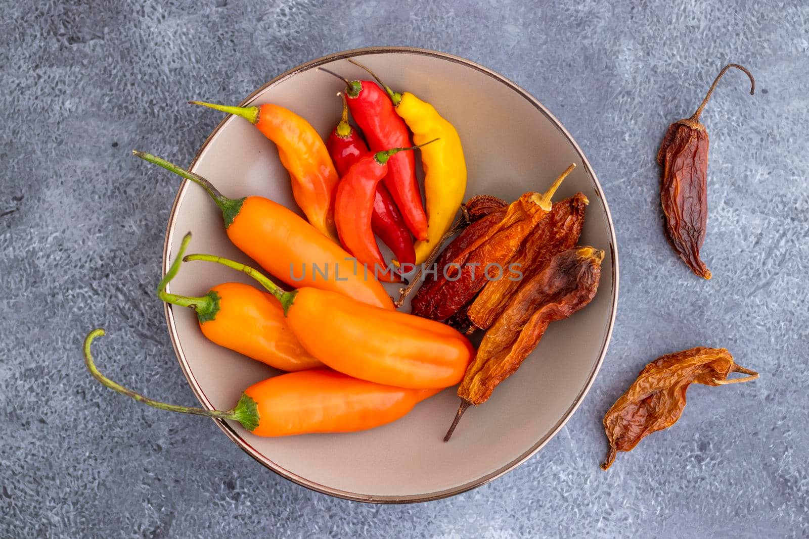 View of several Peruvian peppers, such as yellow chili, limo chili and paprika