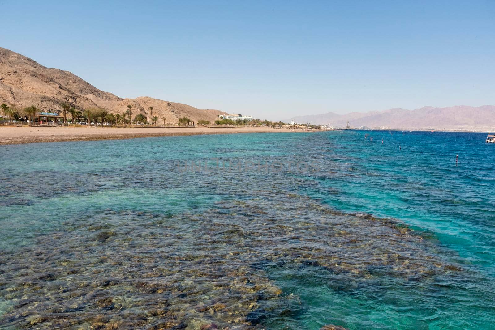 A view of the coral reef above the water. The Red Sea. Beach in the city of Eilat, Israel High angel. High quality photo