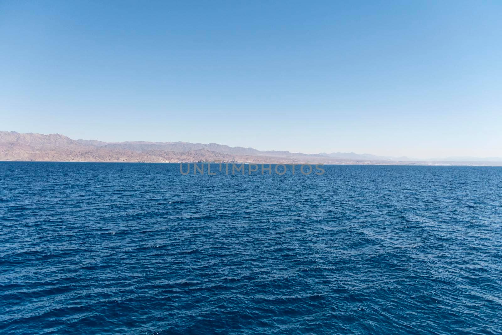 A view of the coral reef above the water. The Red Sea. Beach in the city of Eilat, Israel High angel by avirozen