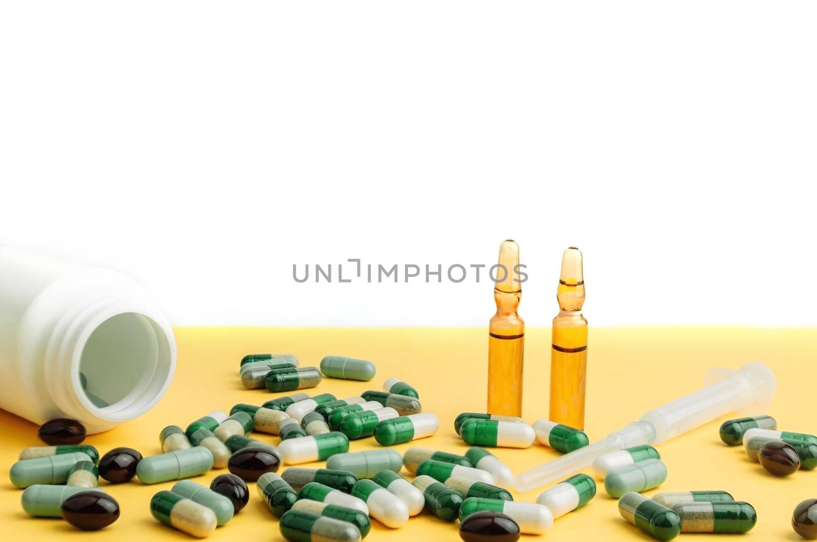 drug in tablets and capsules, ampoules with medicines, syringes isolated on white background. Pharmacy, people and health concept. Online drug orders, online shopping.