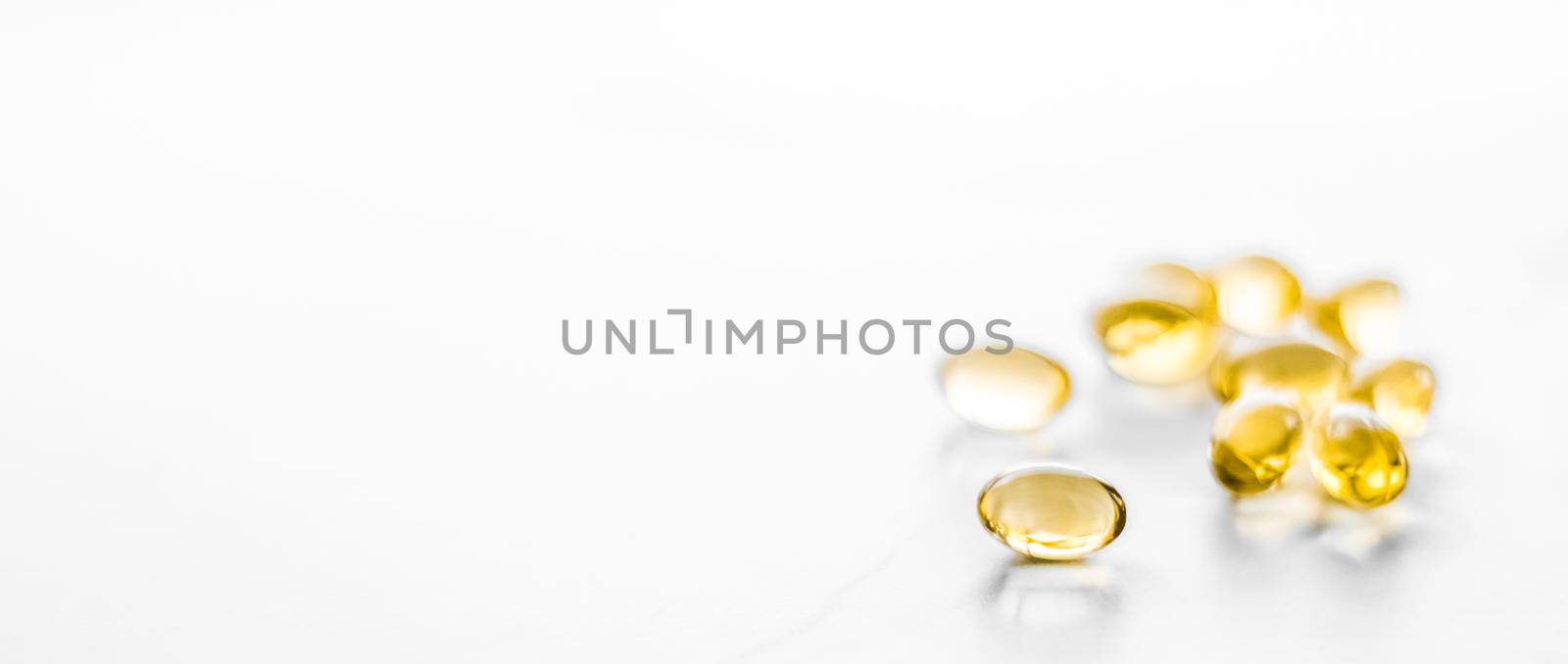 Pharmaceutical, branding and science concept - Vitamin D and golden Omega 3 pills for healthy diet nutrition, fish oil food supplement pill capsules, healthcare and medicine as pharmacy background