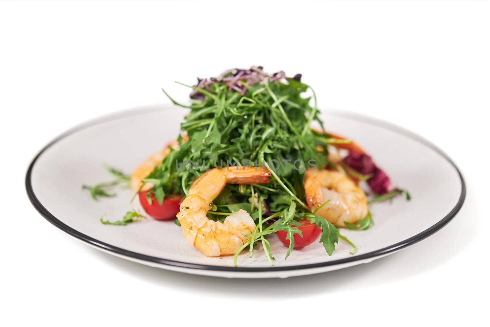 Elegant plate with fresh appetizing salad.  by SerhiiBobyk