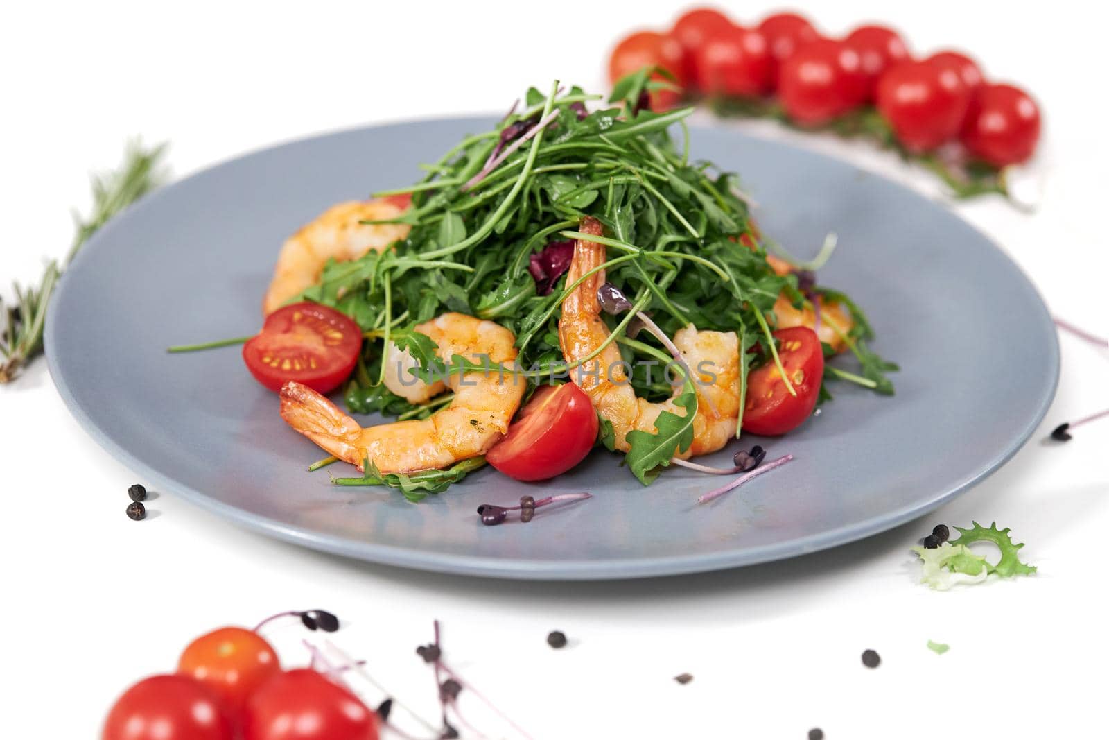 Tasty salad with juicy shrimps,tomatoes and fresh arugula.  by SerhiiBobyk
