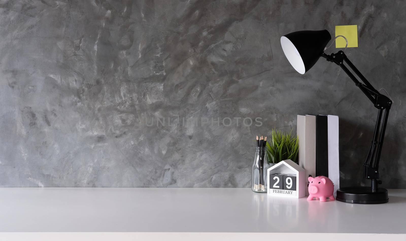 Workspace Mock up marble tabletop with pencils, smart calendar and book. copy space desk with copy space for products display montage