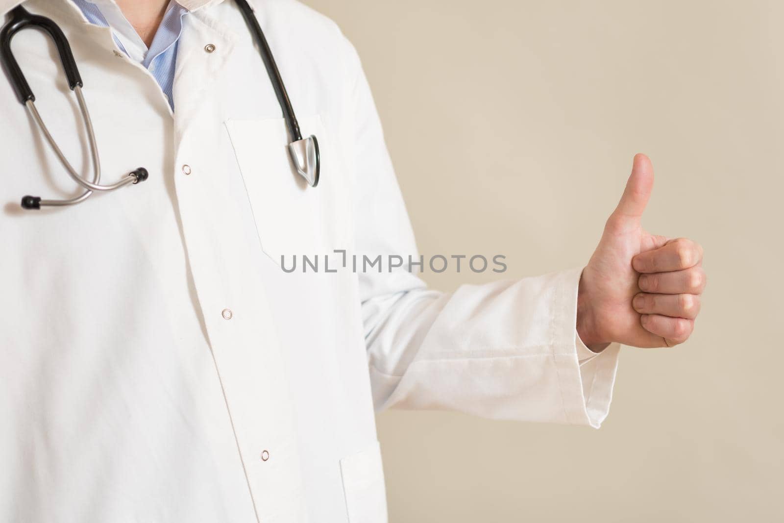 Image of male doctor showing thumb up.