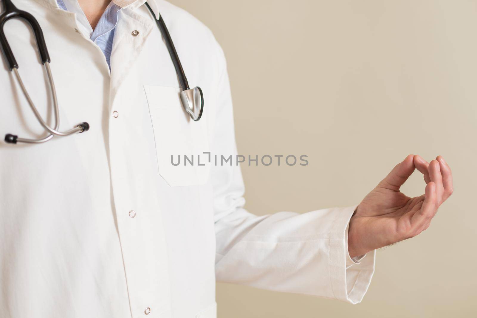 Image of male doctor meditating.