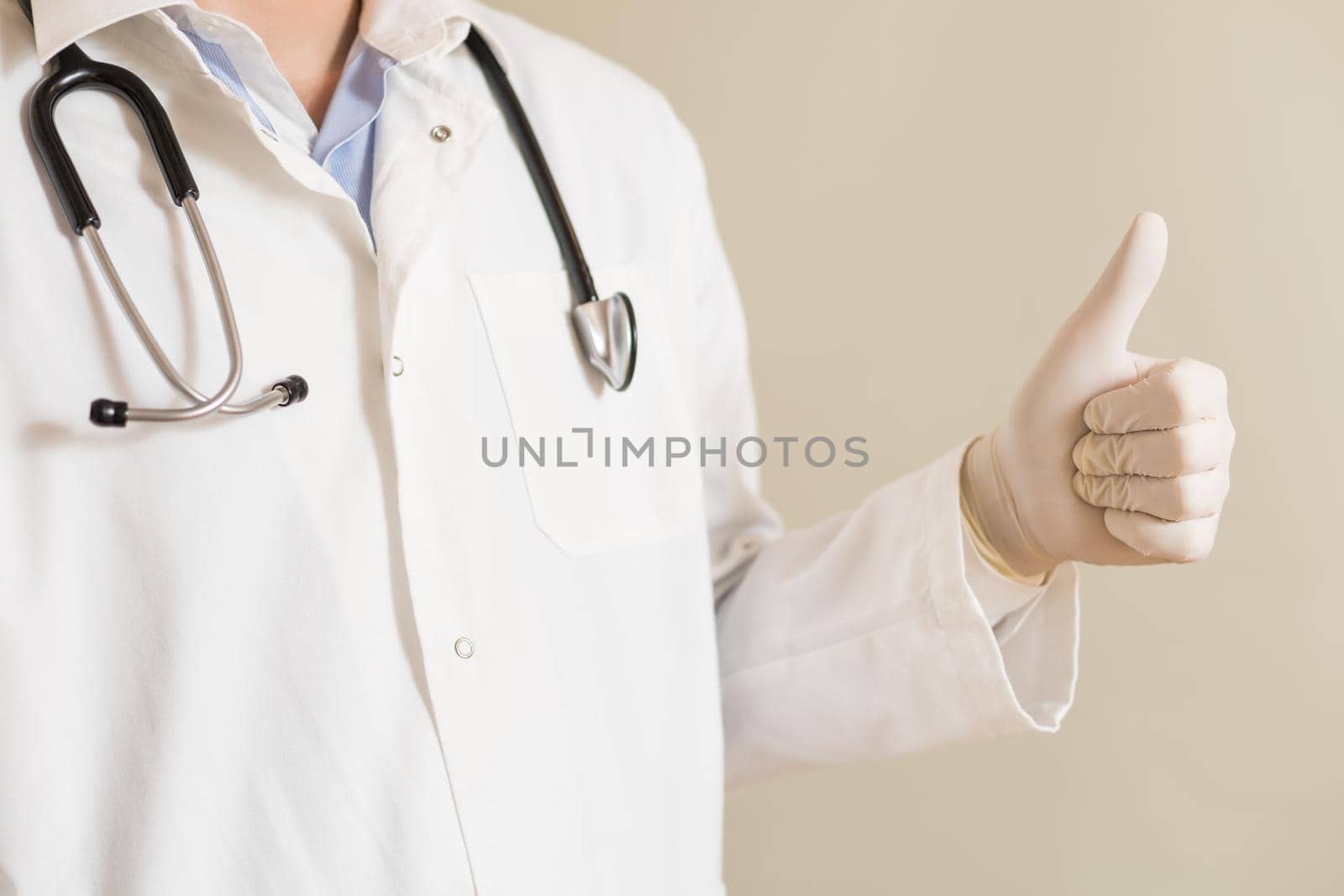 Image of male doctor showing thumb up.