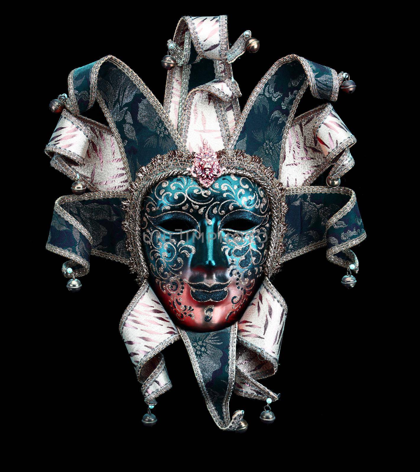 A Blue red and pink Venice carnival mask on a black background