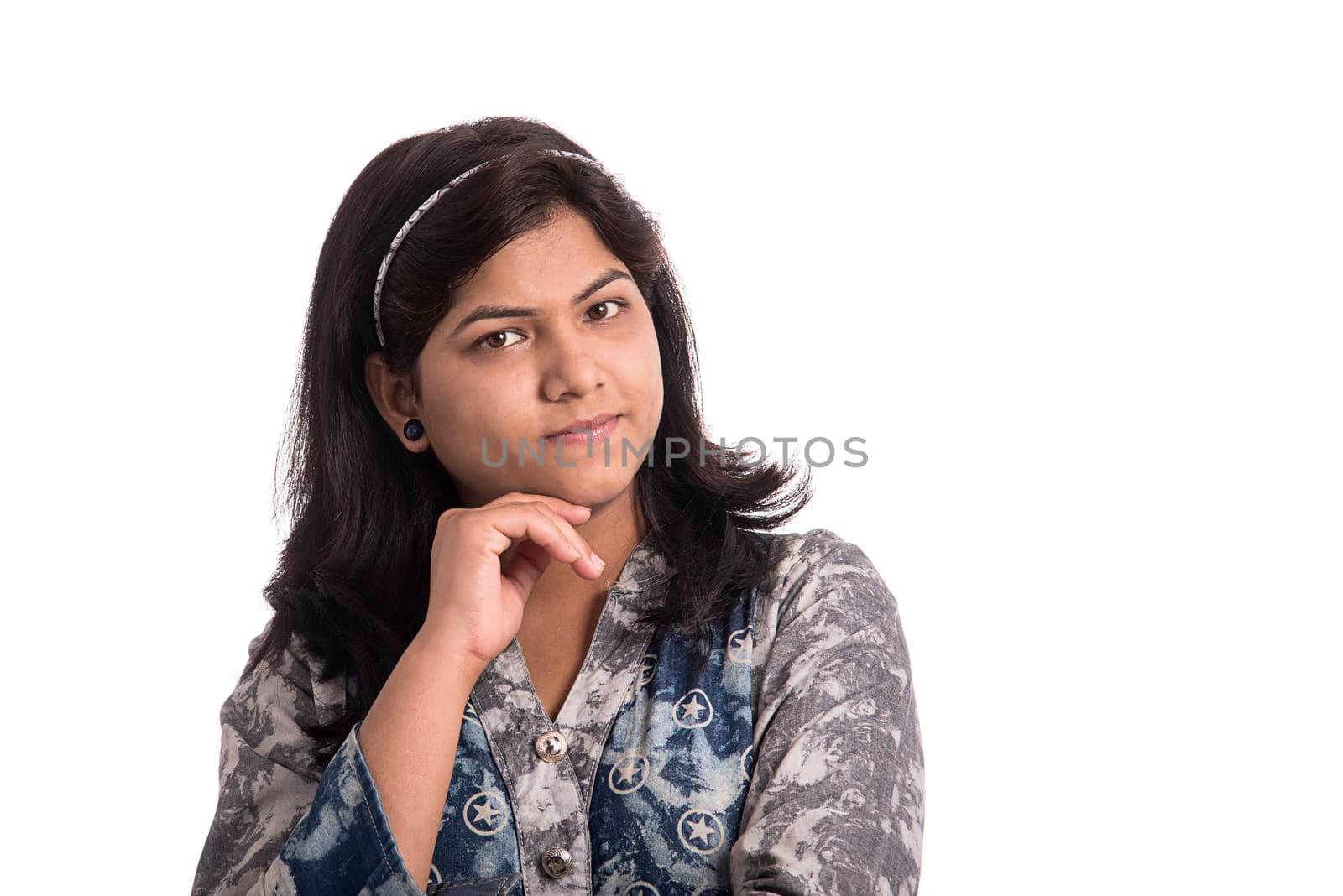 Portrait of beautiful young smiling girl on a white background.