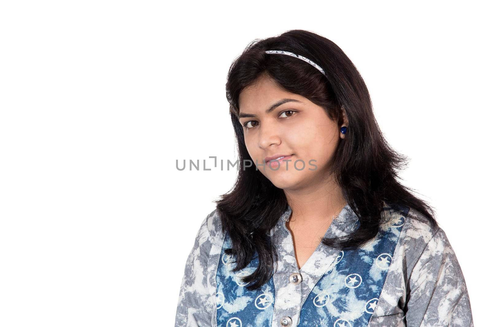 Portrait of beautiful young smiling girl on a white background.