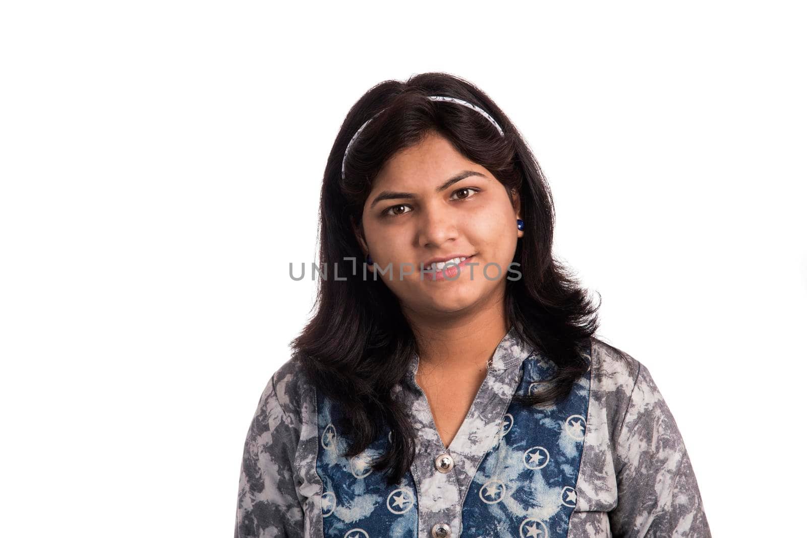 Portrait of beautiful young smiling girl on a white background.