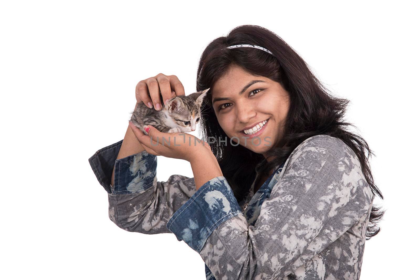 young attractive girl with cat on white background
