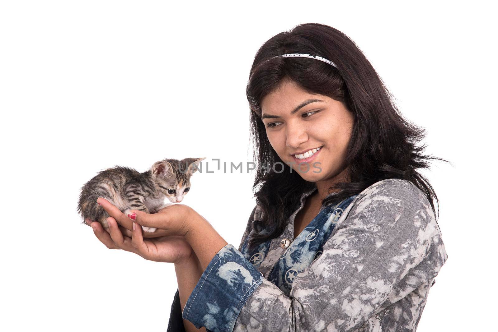 young attractive girl with cat on white background