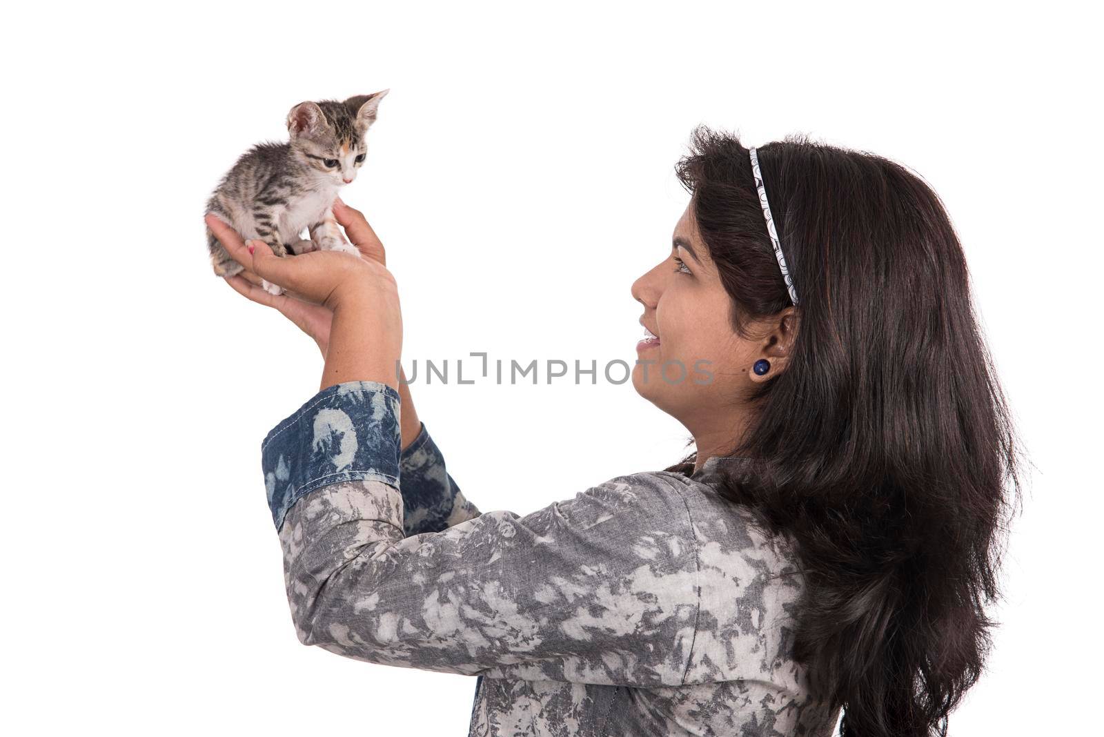 young attractive girl with cat on white background