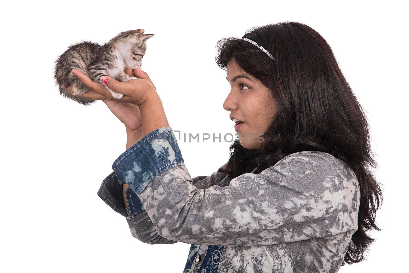 young attractive girl with cat on white background