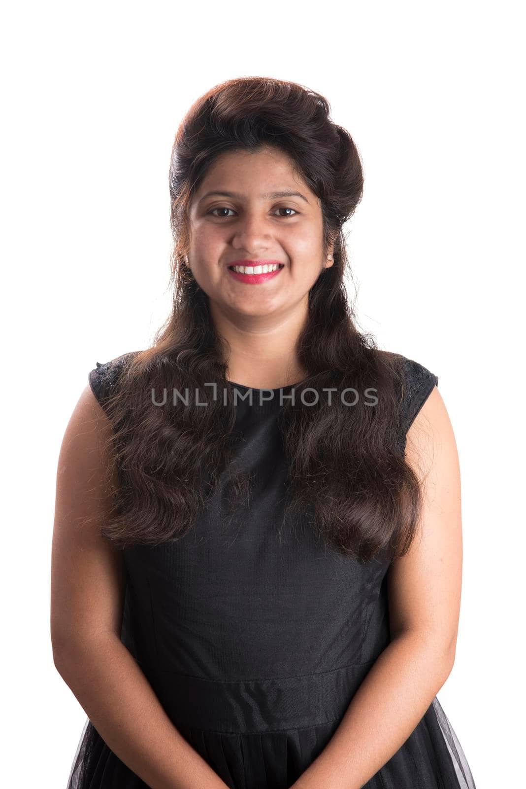 Portrait of beautiful young smiling girl on a white background.