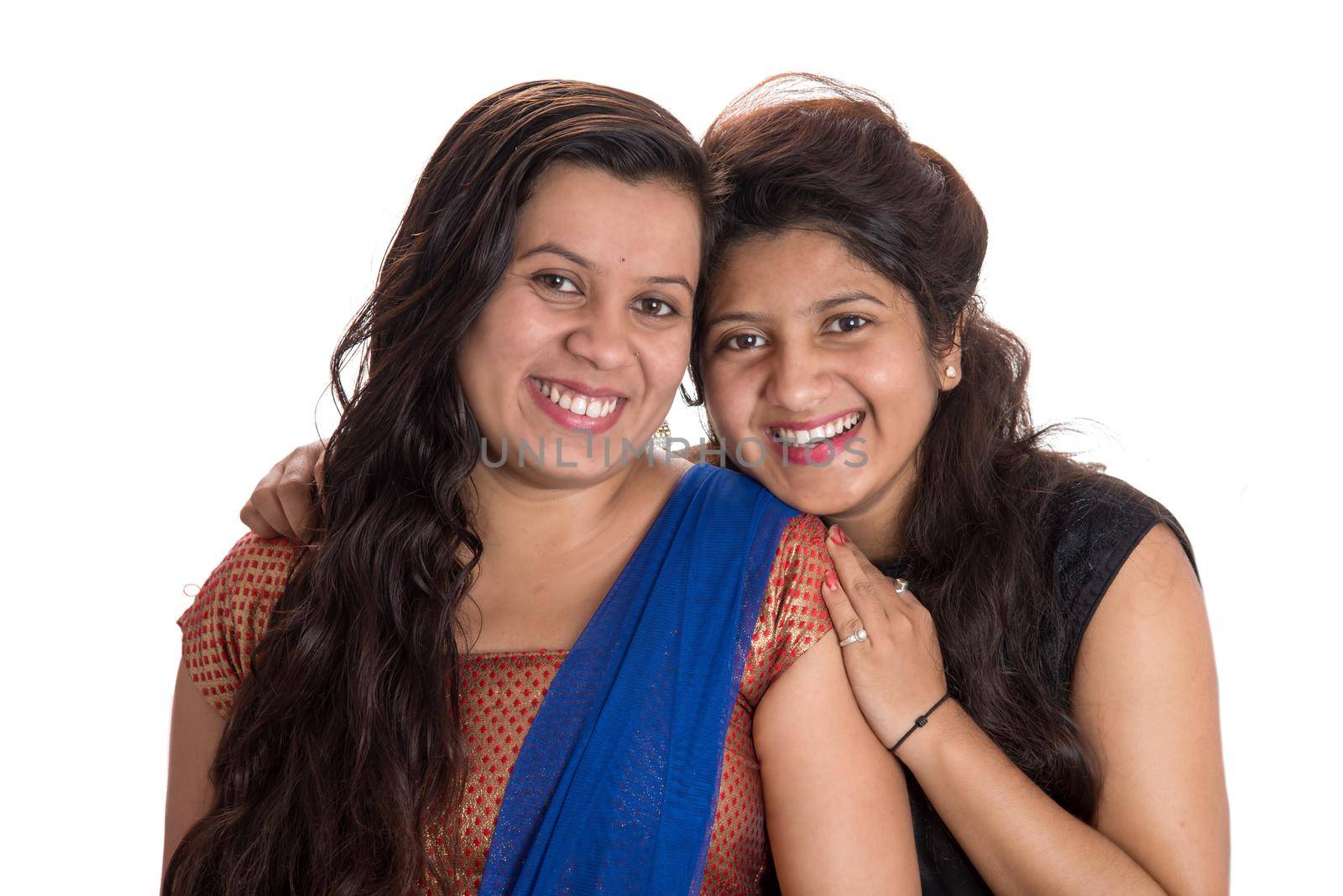 Portrait of happy young girls on a white background