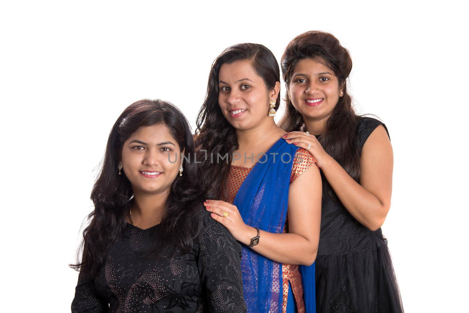 Portrait of happy young girls on a white background