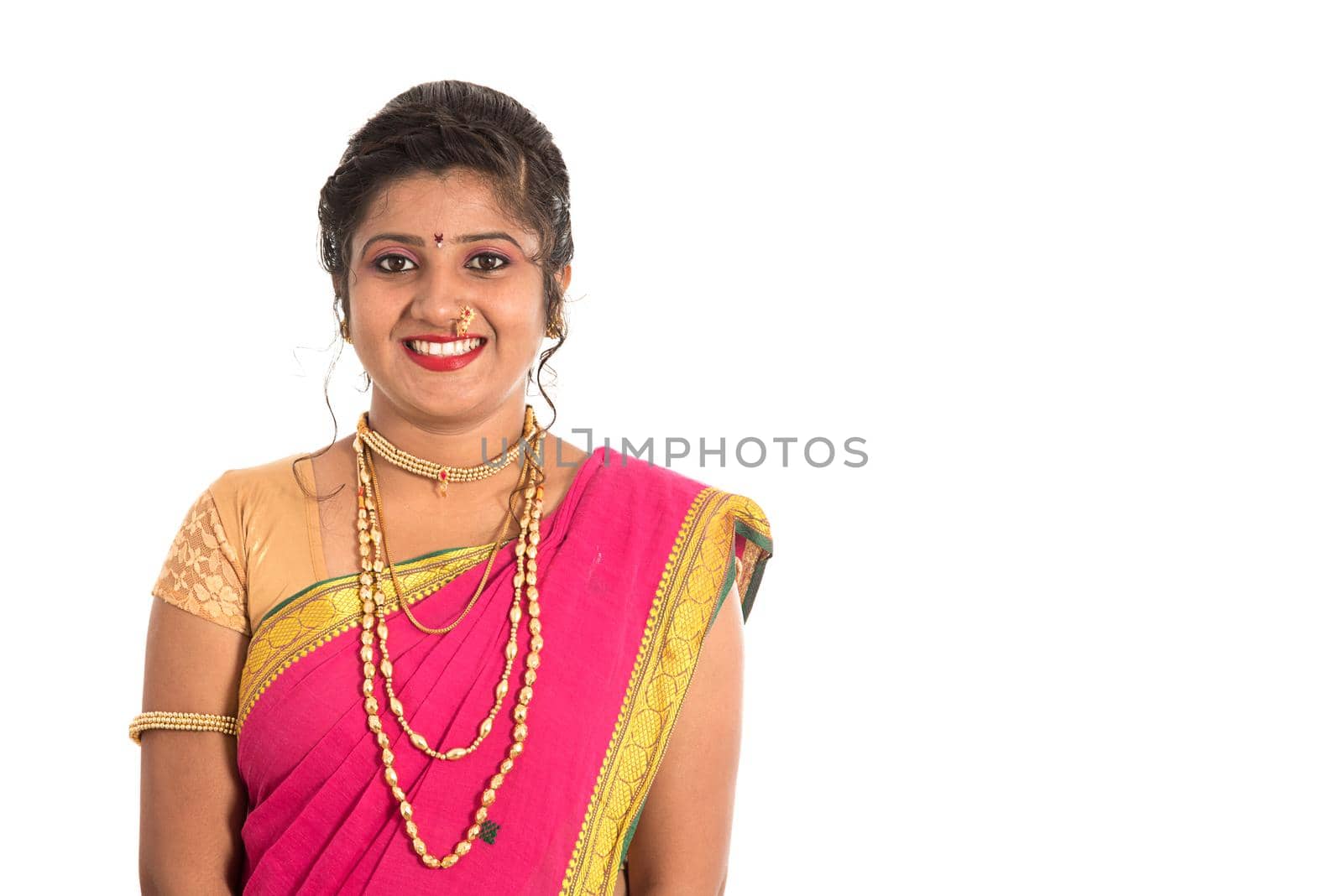 Close up of Beautiful Indian Traditional young girl in saree on white background