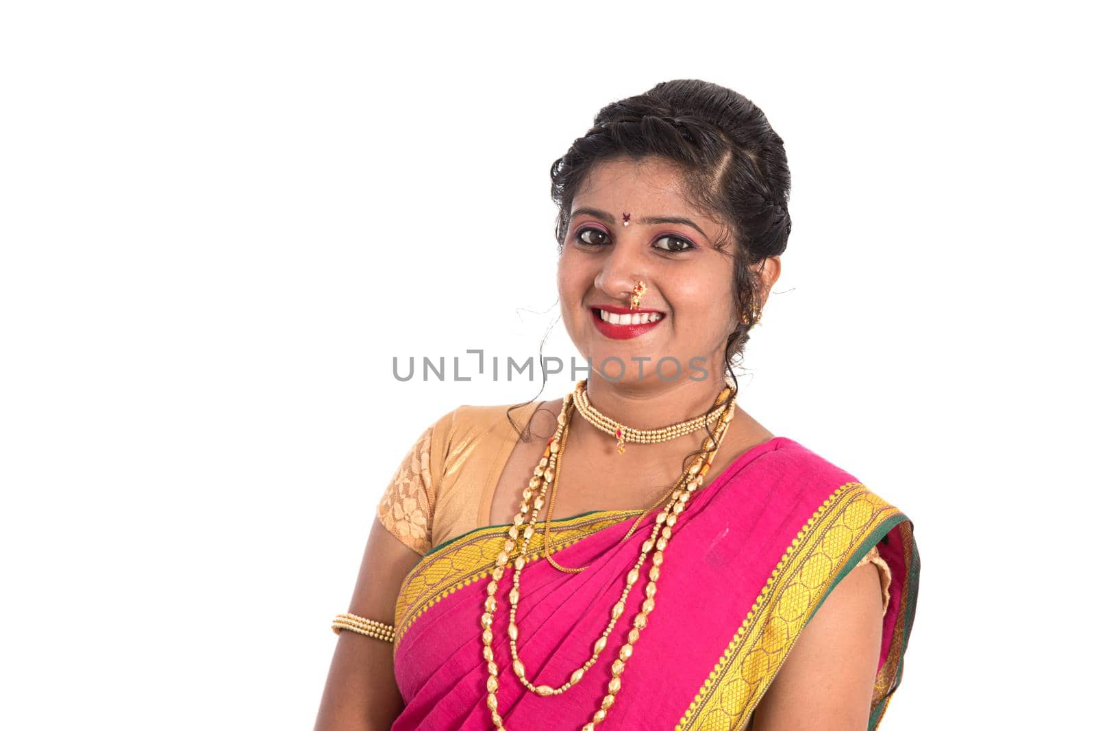 Close up of Beautiful Indian Traditional young girl in saree on white background