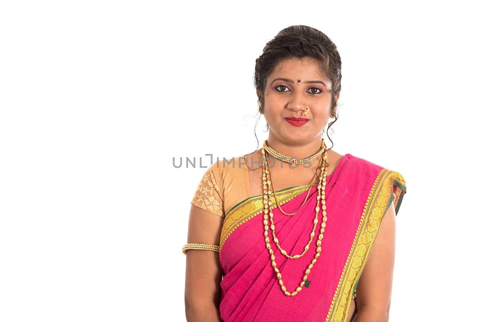 Close up of Beautiful Indian Traditional young girl in saree on white background