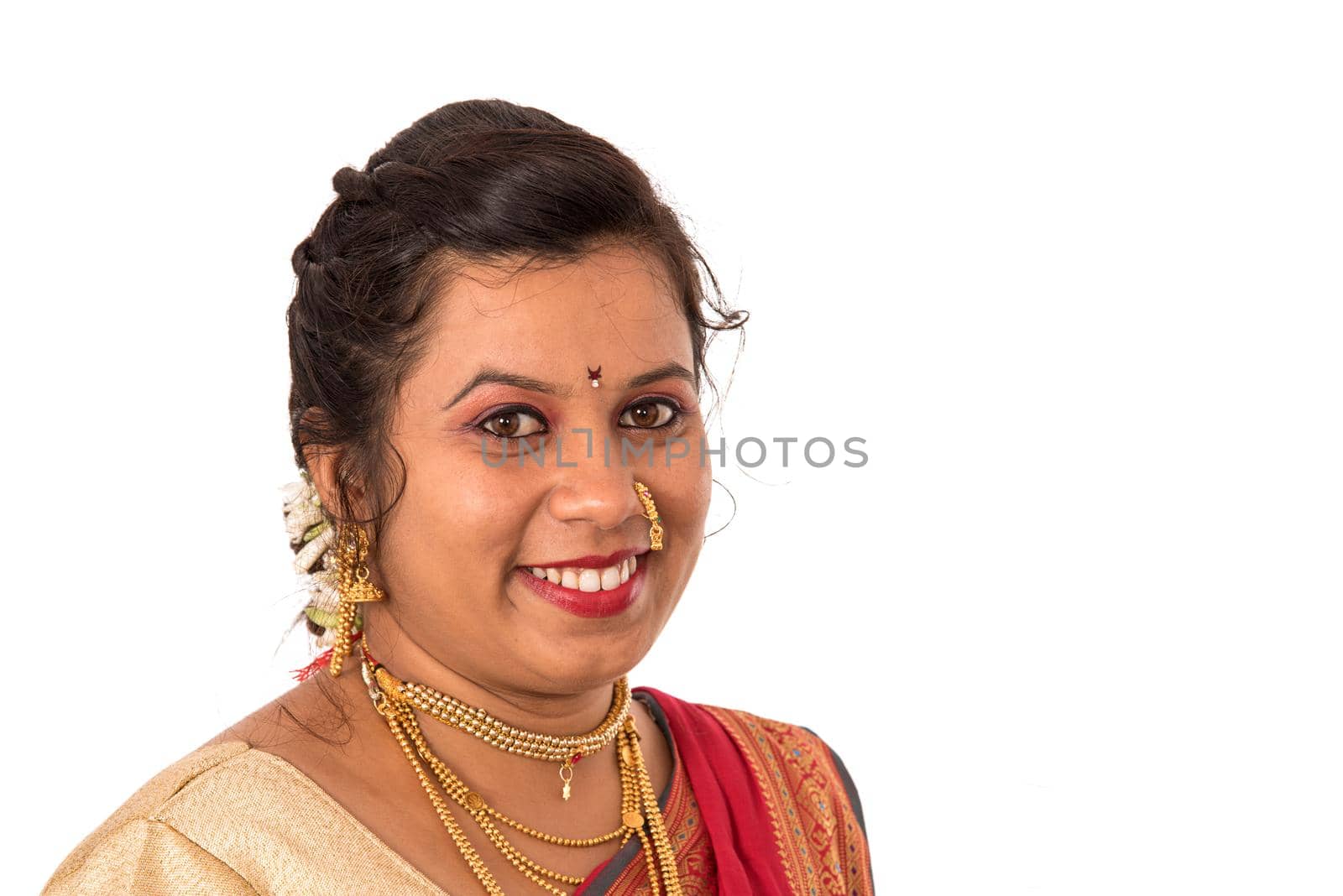 Close up of Beautiful Indian Traditional young girl in saree on white background