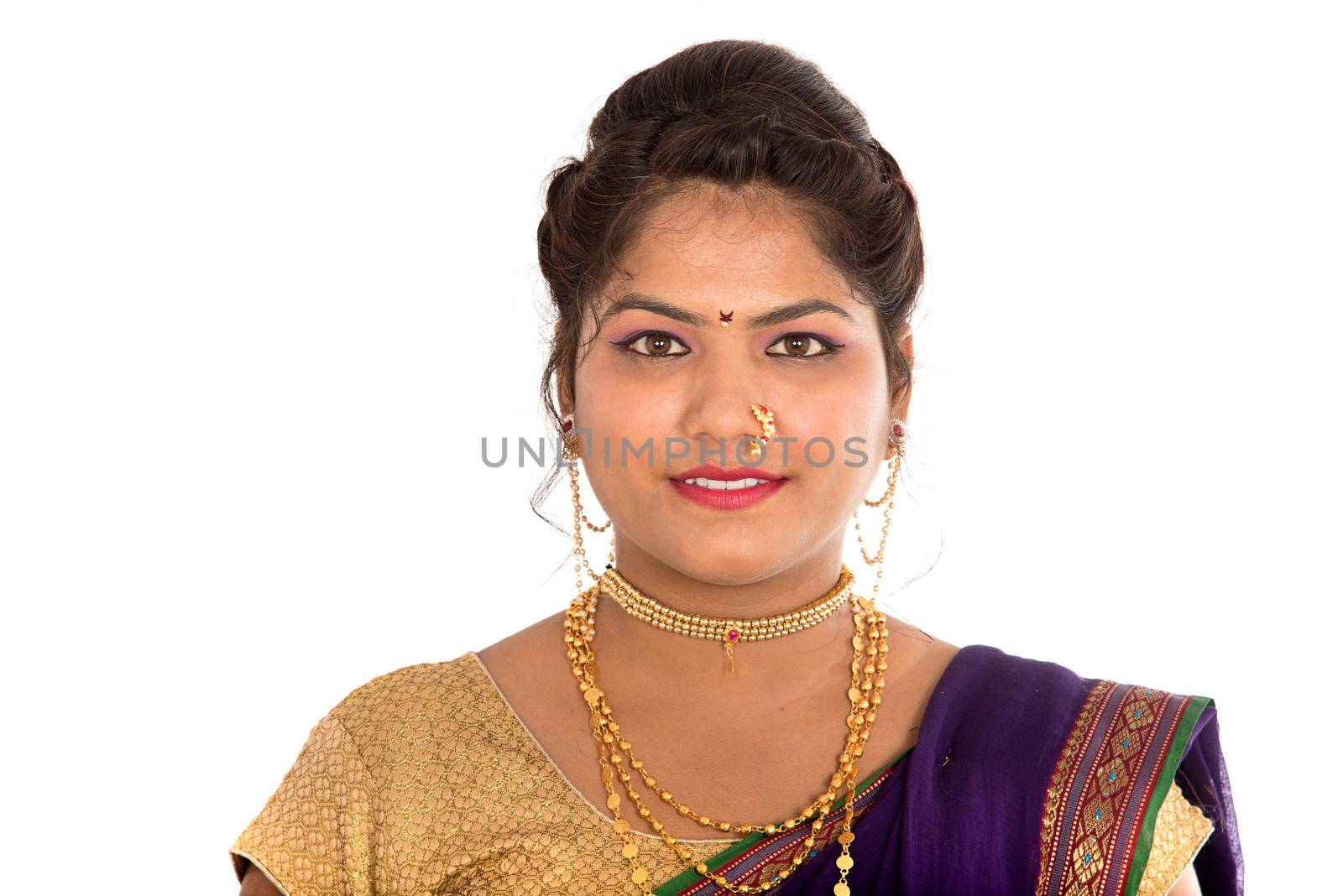 Close up of Beautiful Indian Traditional young girl in saree on white background