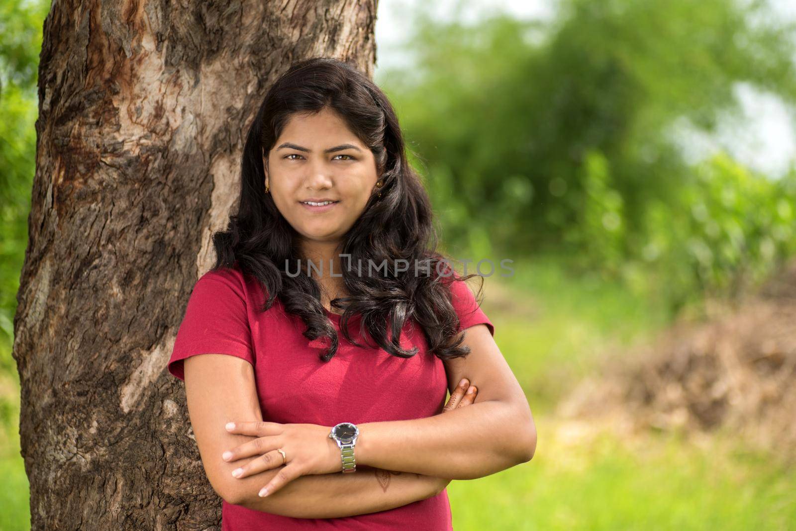 Portrait of beautiful Young girl outdoors in park.