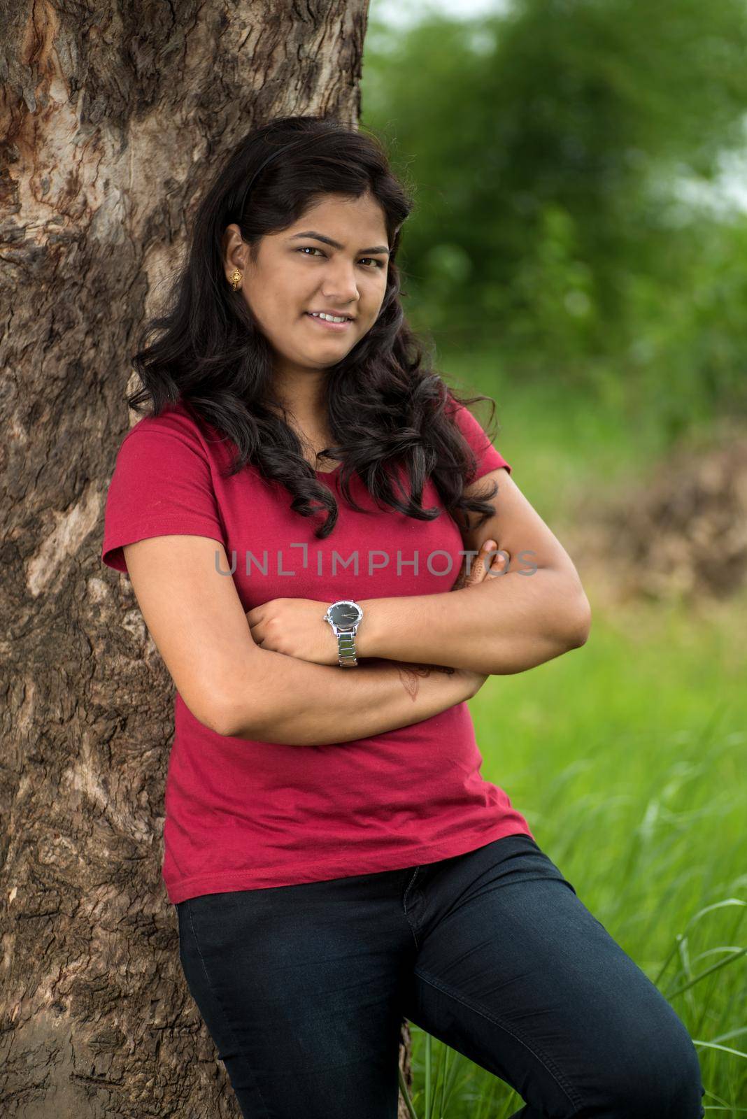 Portrait of beautiful Young girl outdoors in park.