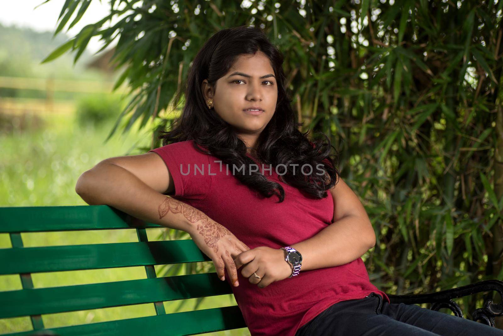 Portrait of beautiful Young girl outdoors in park. by DipakShelare