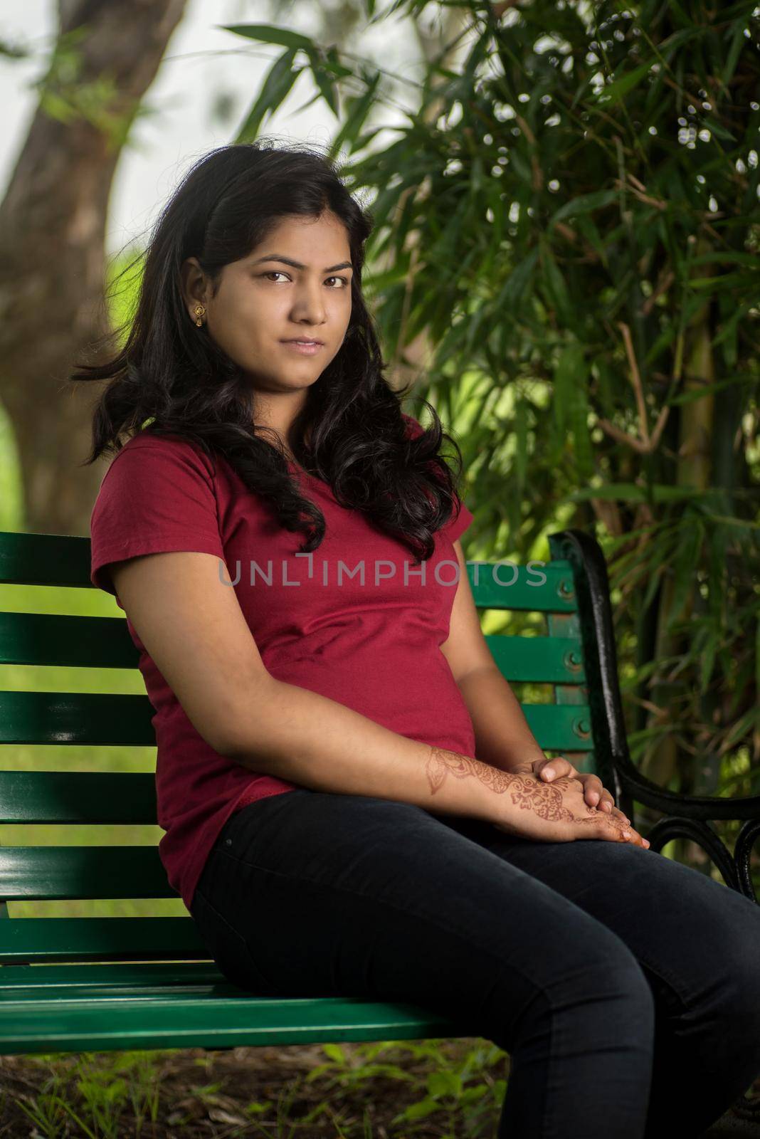 Portrait of beautiful Young girl outdoors in park.