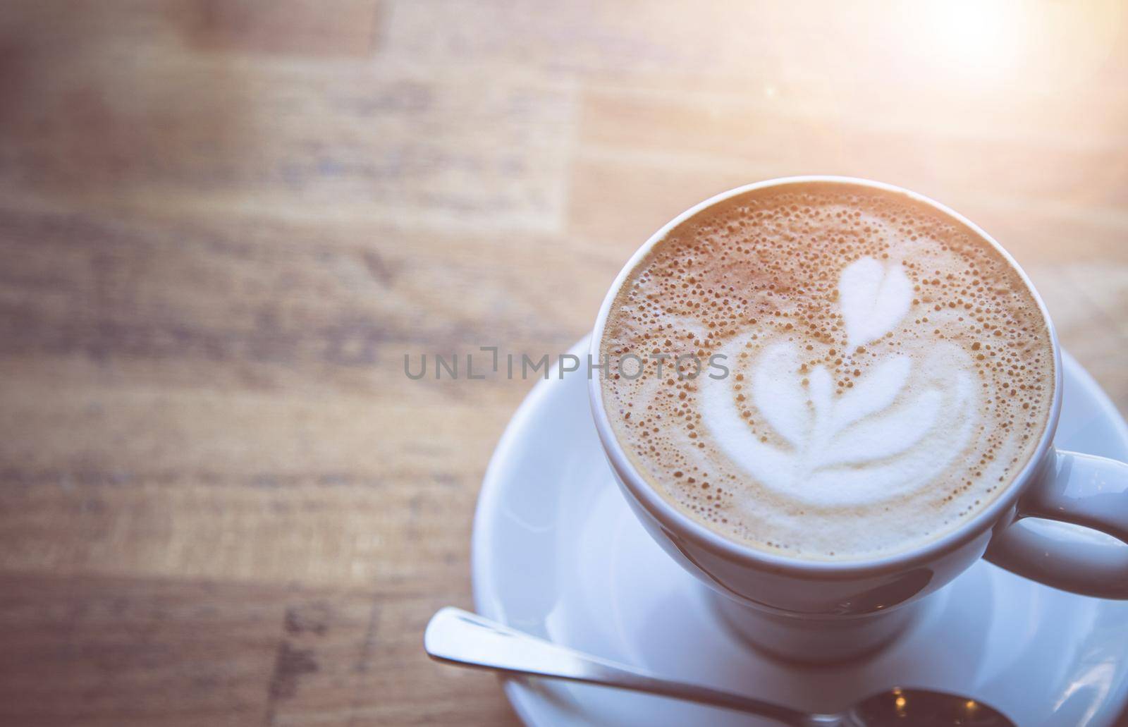Cup of fresh brewed cappuccino in an Italian café